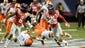 Mississippi wide receiver Cody Core scores a touchdown on a 76-yard pass past Boise State safety Jeremy Ioane at the Georgia Dome.