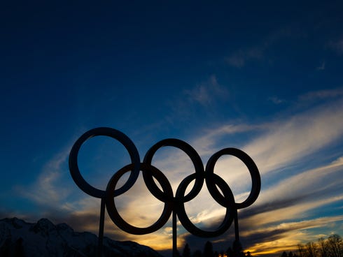 A view of the Olympic rings as the sun sets at the Laura Cross Country Ski and Biathlon Center during the Sochi 2014 Olympic Winter Games on Feb. 14, 2014.