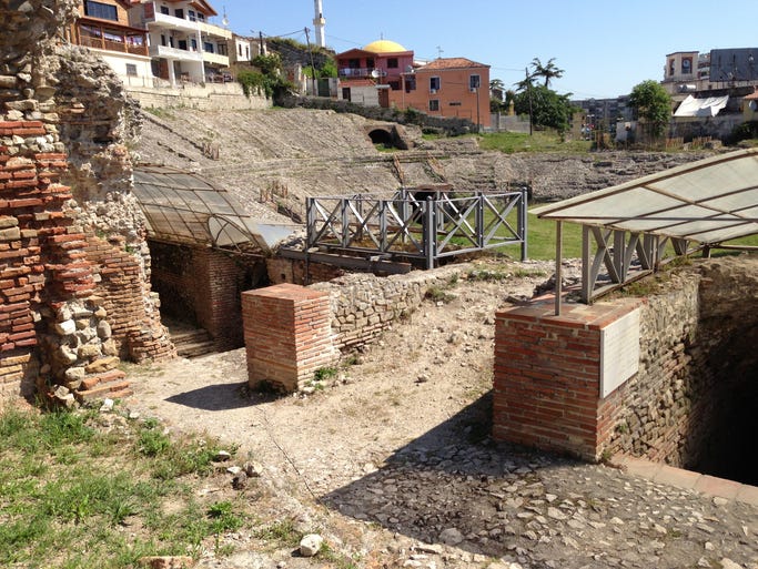 The Albanian Riviera begins at Durres, site of a Roman amphitheater. The Amfiteatri, at barely a third the size of Rome's Coliseum, is a pocket-sized replica uncovered in 1966.