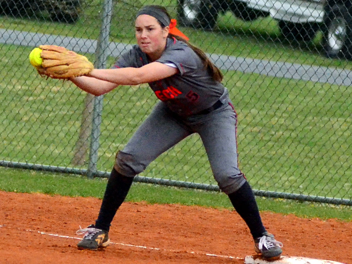 Beech High sophomore Kaylor Chaffin hangs on to a second-inning throw at first base. Chaffin scored three runs in the Lady Buccaneers’ 22-11 victory over Station Camp.