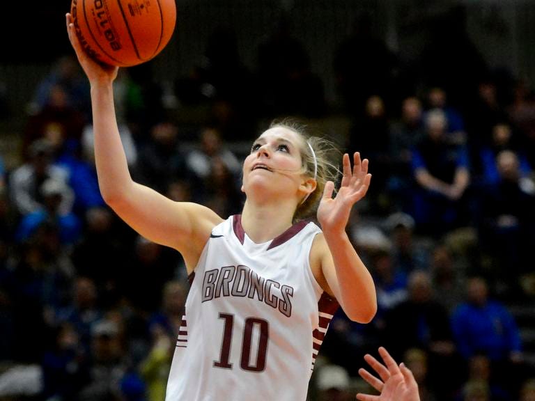 Hamilton's Jaylee Albert shoots a layup during State A semifinal action against Columbia Falls Friday night at Four Seasons Arena.
