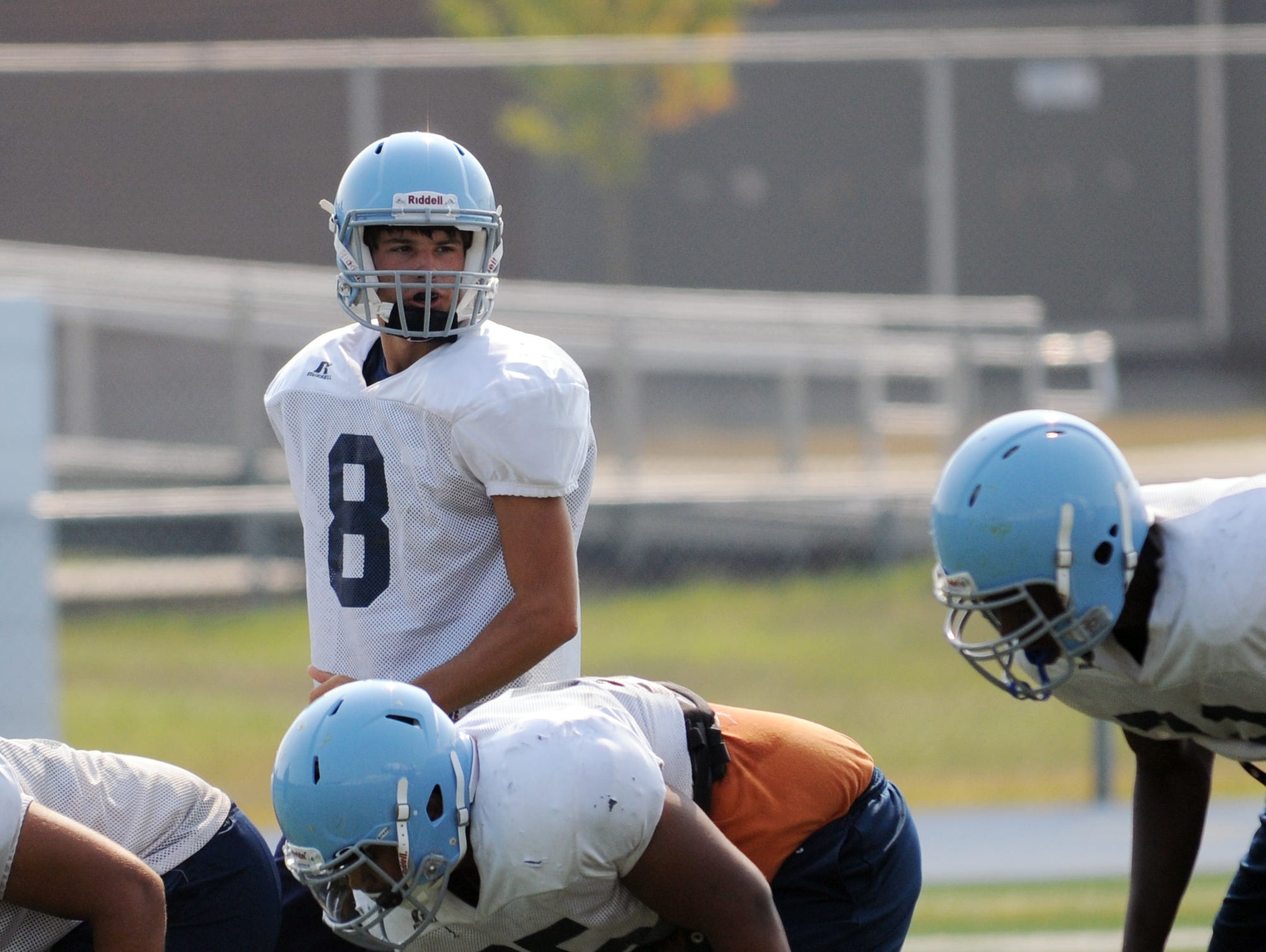 Cape Henlopen junior quarterback Dillon Adams (8) takes first-team snaps during practice Friday, Sept. 4.