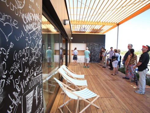 The Czech Republic house at the Solar Decathlon, shown here on October 5, 2013 at Orange County Great Park in Irvine, Calif., has a charging station for a pedelec (electric bike) as well as a painted do-it-yourself wall facade that allows occupants t