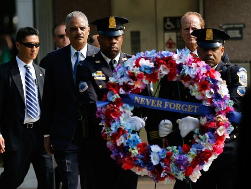 Attorney General Eric Holder, second from left, and