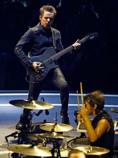 Matthew Bellamy and Dominic Howard of Muse performs