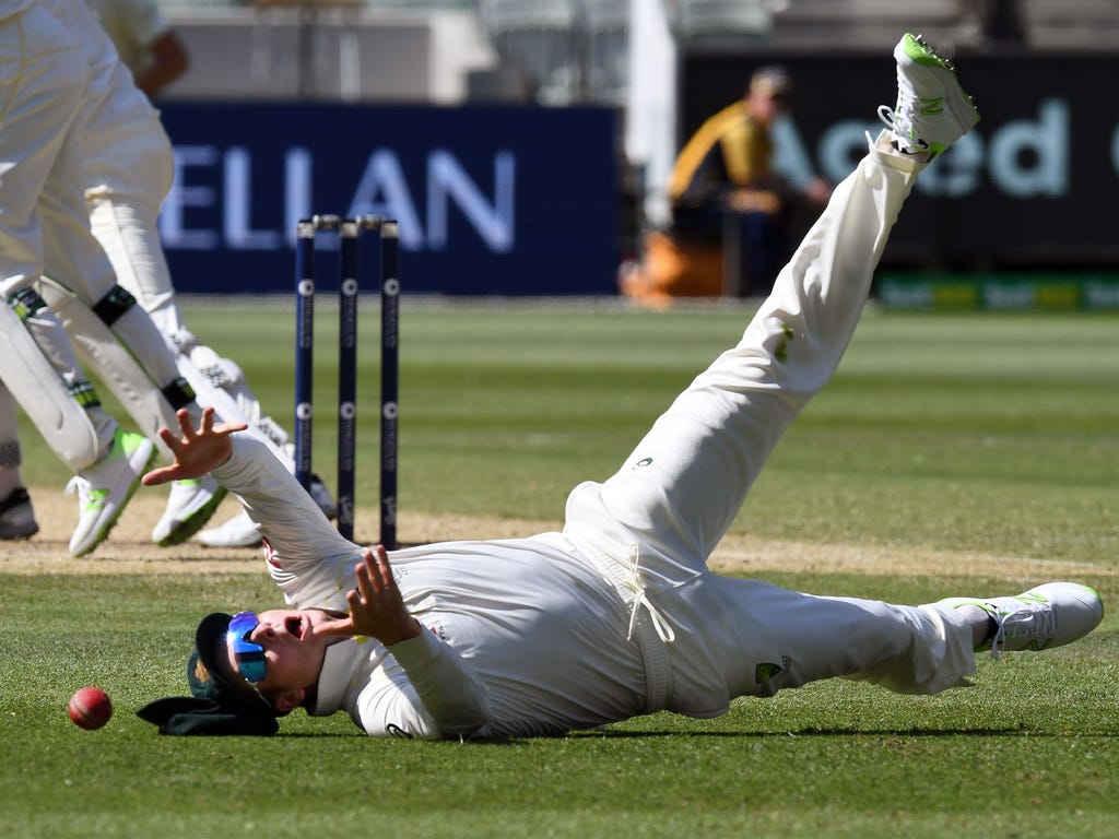 Australia's Steve Smith drops a catch from England batsman Alastair Cook on the second day of the fourth Ashes cricket Test match at the MCG in Melbourne.