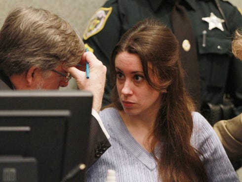 Casey Anthony looks at her attorney, Cheney Mason, before the start of her sentencing hearing on charges of lying to a law enforcement officer at the Orange County Courthouse July 7, 2011 in Orlando, Fla.  Anthony was acquitted of murder charges on J