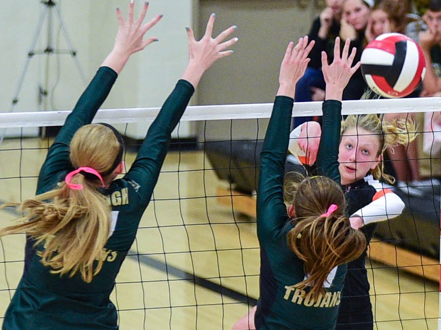West Des Moines Valley's Hannah Lockin (6) meets a wall of arms from Iowa City West's defense at the Class 5A-Region 5 regional finals held at Newton High School on Tuesday, Nov. 4, 2014.