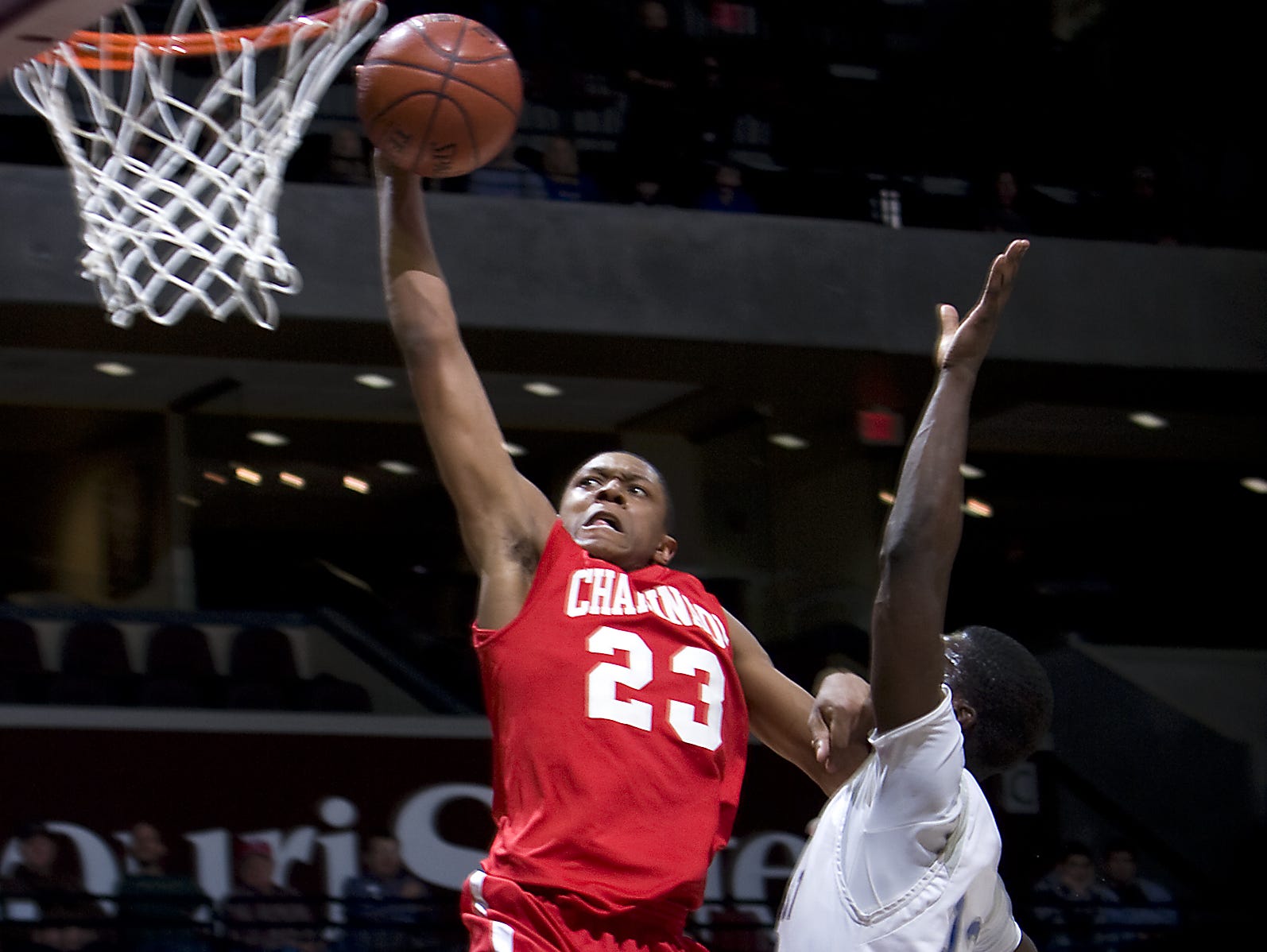 Chaminade College Prep guard Bradley Beal, left, dunks the basketball over the defense of Hillcrest Hornets forward Dorial Green-Beckham, right, in the 2010 Bass Pro Tournament of Champions at JQH Arena.