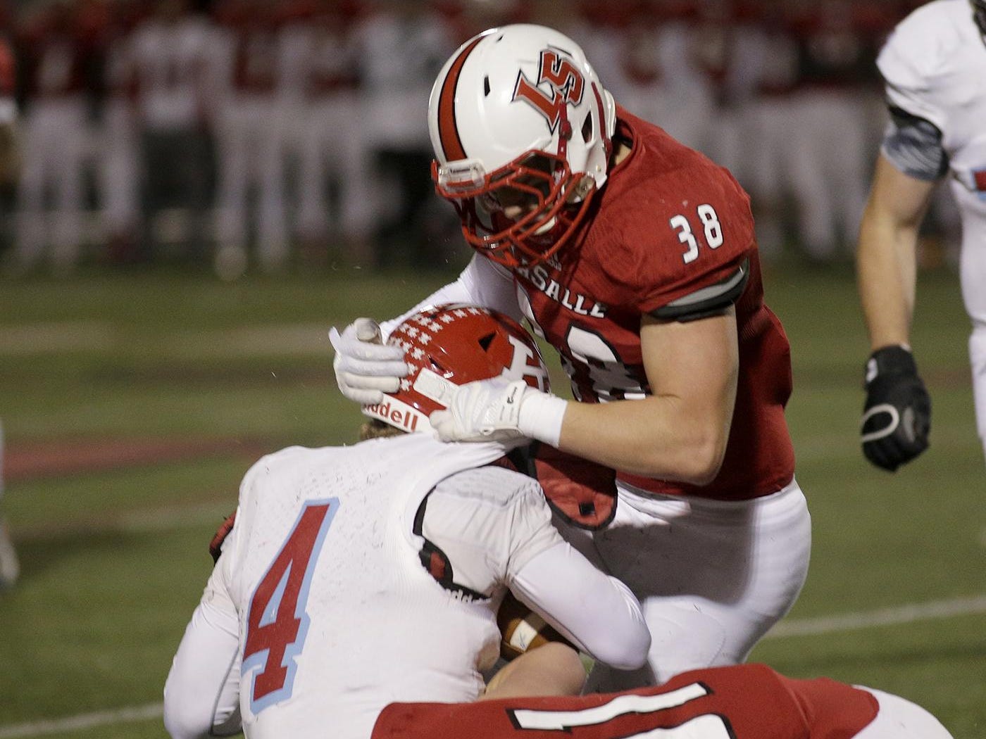 La Salle’s Hayden Jester, shown tackling Kings quarterback Tyler Knecht, was named the Ohio Enquirer Preps Athlete of the Week.