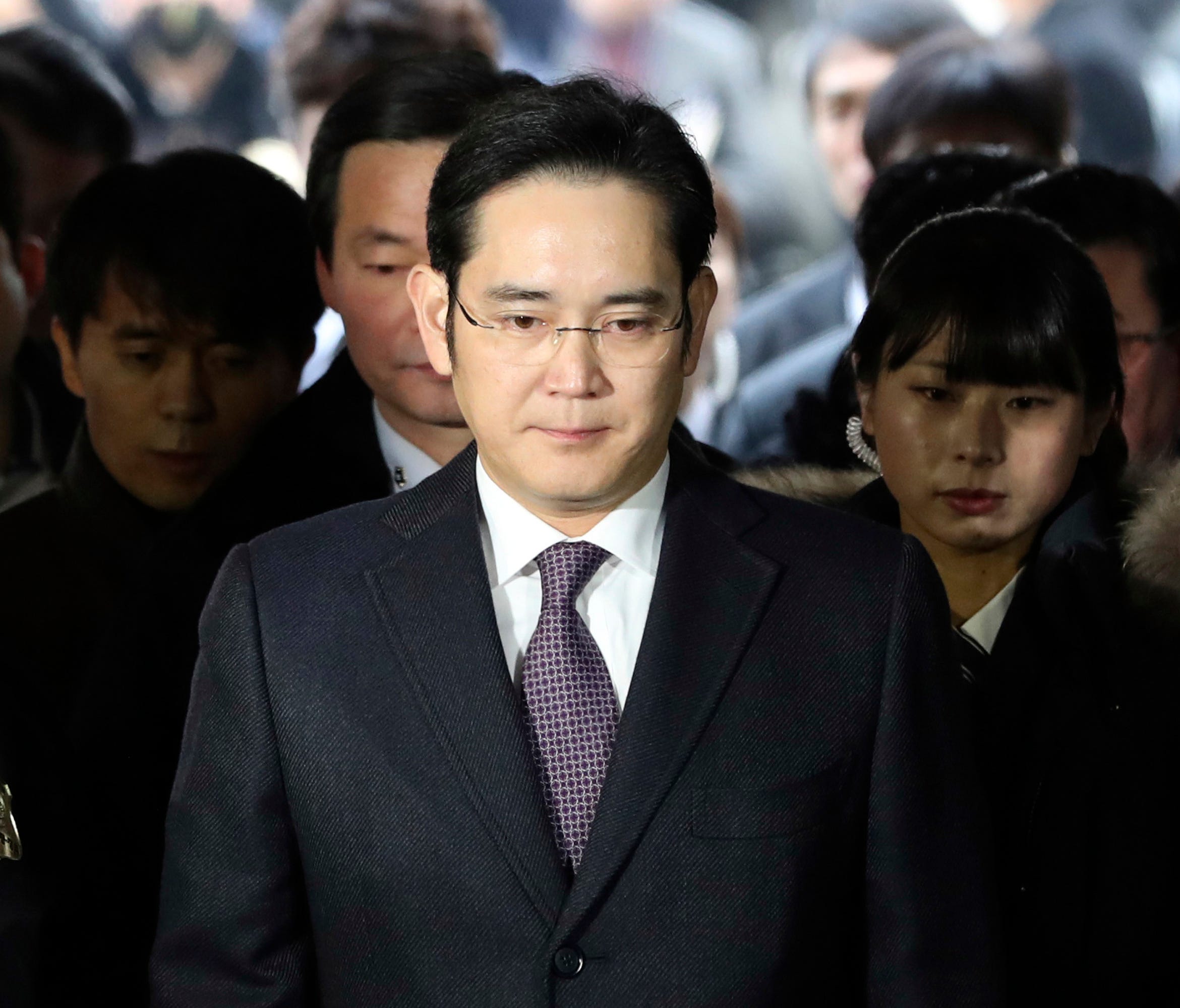 In this Jan. 18, 2017, file photo, Lee Jae-yong, front, a vice chairman of Samsung Electronics Co. arrives for the hearing at the Seoul Central District Court in Seoul, South Korea.