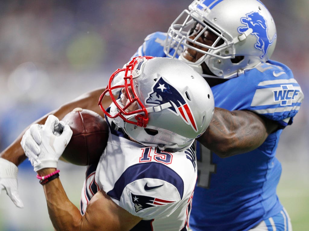Patriots receiver Chris Hogan (15) hauls in first-quarter touchdown catch behind Lions cornerback Nevin Lawson (24) during a preseason game in Detroit. Hogan caught two touchdown passes to help the Patriots win 30-28.