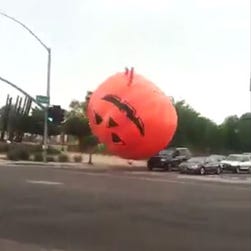 PHOTOS: Giant inflatable pumpkin breaks loose during storms