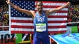 Christian Taylor of the United States celebrates after