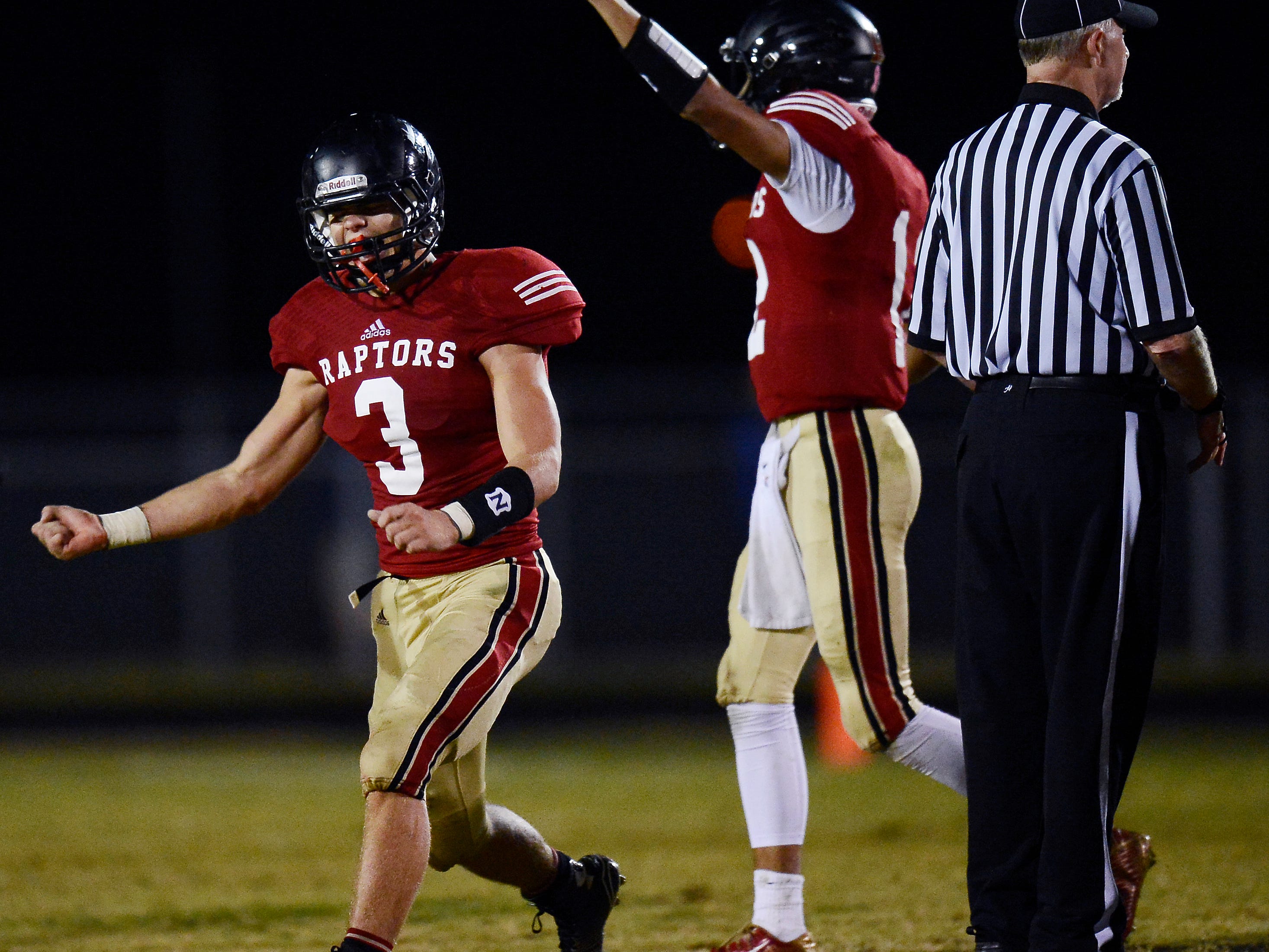 Ravenwood wide receiver Austin Burt (3) and quarterback Cole Brown (12) celebrate after beating Centennial 24-0 two weeks ago.