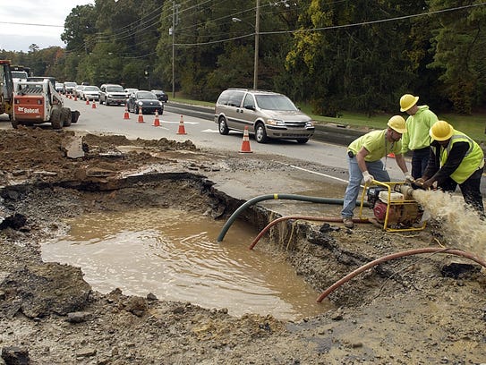 A 6-inch water line break caused a large sinkhole at