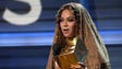 Beyonce accepts the Grammy for Best Urban Contemporary