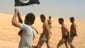 Men are marched barefoot along a desert road Aug. 27 before being reportedly executed by Islamic State militants at an undisclosed location in Raqqa. Islamic State fighters executed 160 Syrian soldiers captured when they seized the Tabqa air base.
