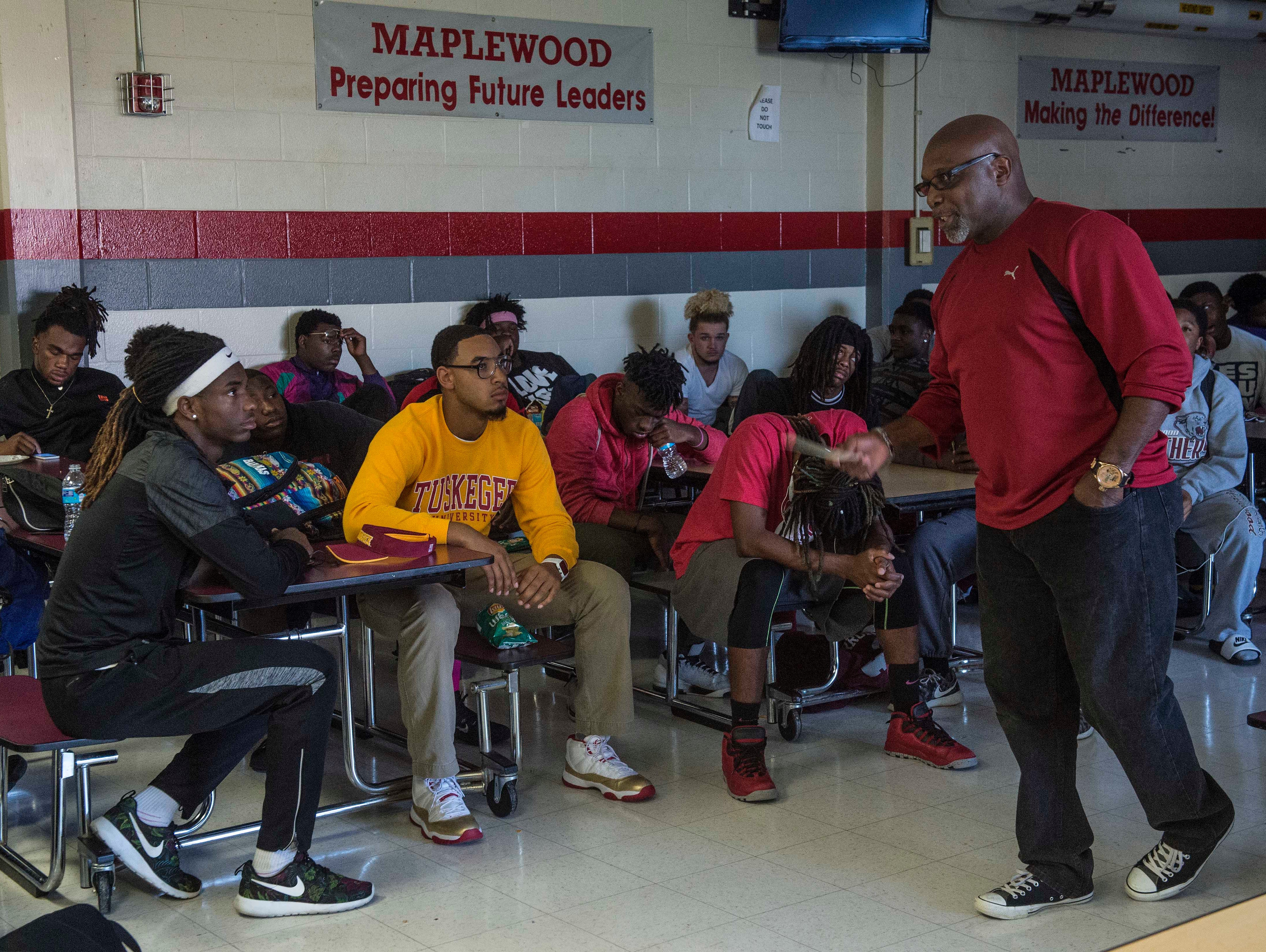 Elder Reggie Holder of Born Again Church and a Maplewood high School alumni gives an inspirational talk to Maplewood football players l on Friday Oct. 16, 2015, in Nashville in Tenn.