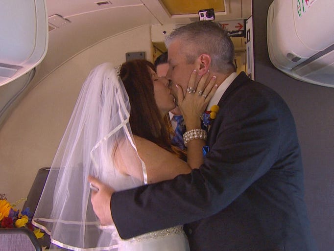 Dottie Coven and Keith Stewart got married in-flight