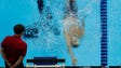 Clark Beach swims during the men's 200-meter backstroke