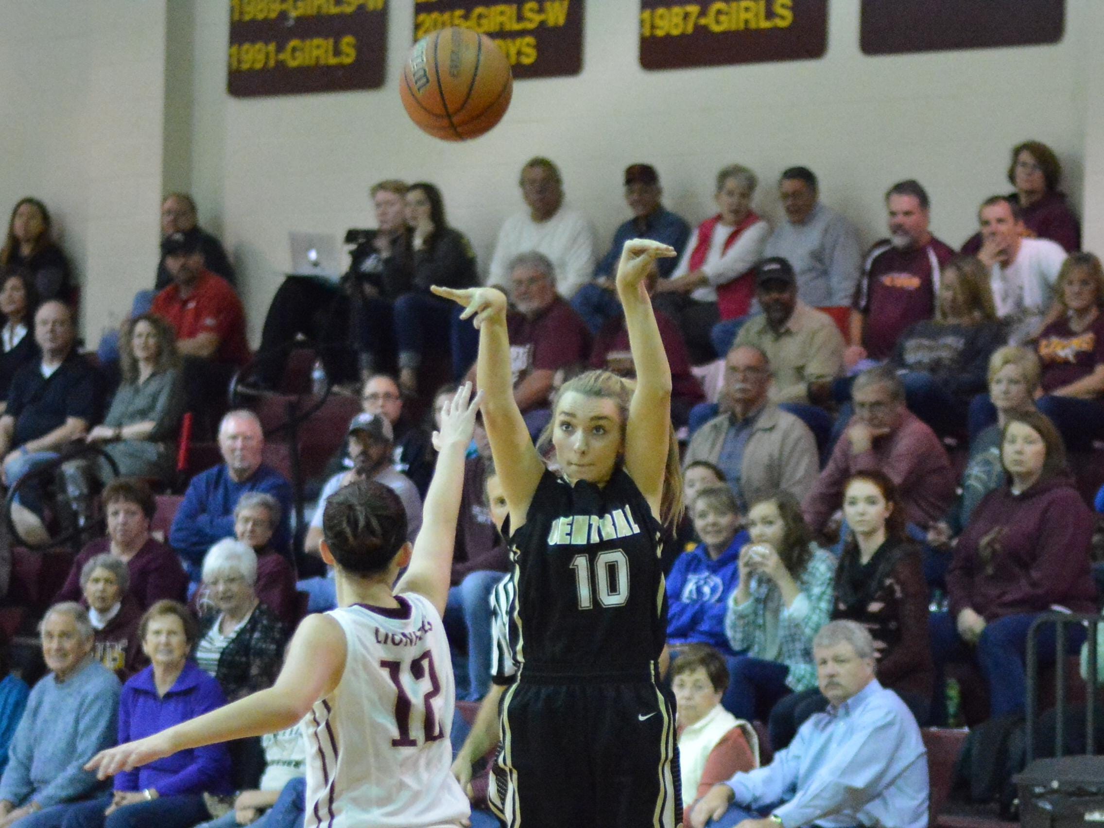 Central Magnet’s Nina Kelly shoots a jumper during the Lady Tigers’ game with the Lionettes.
