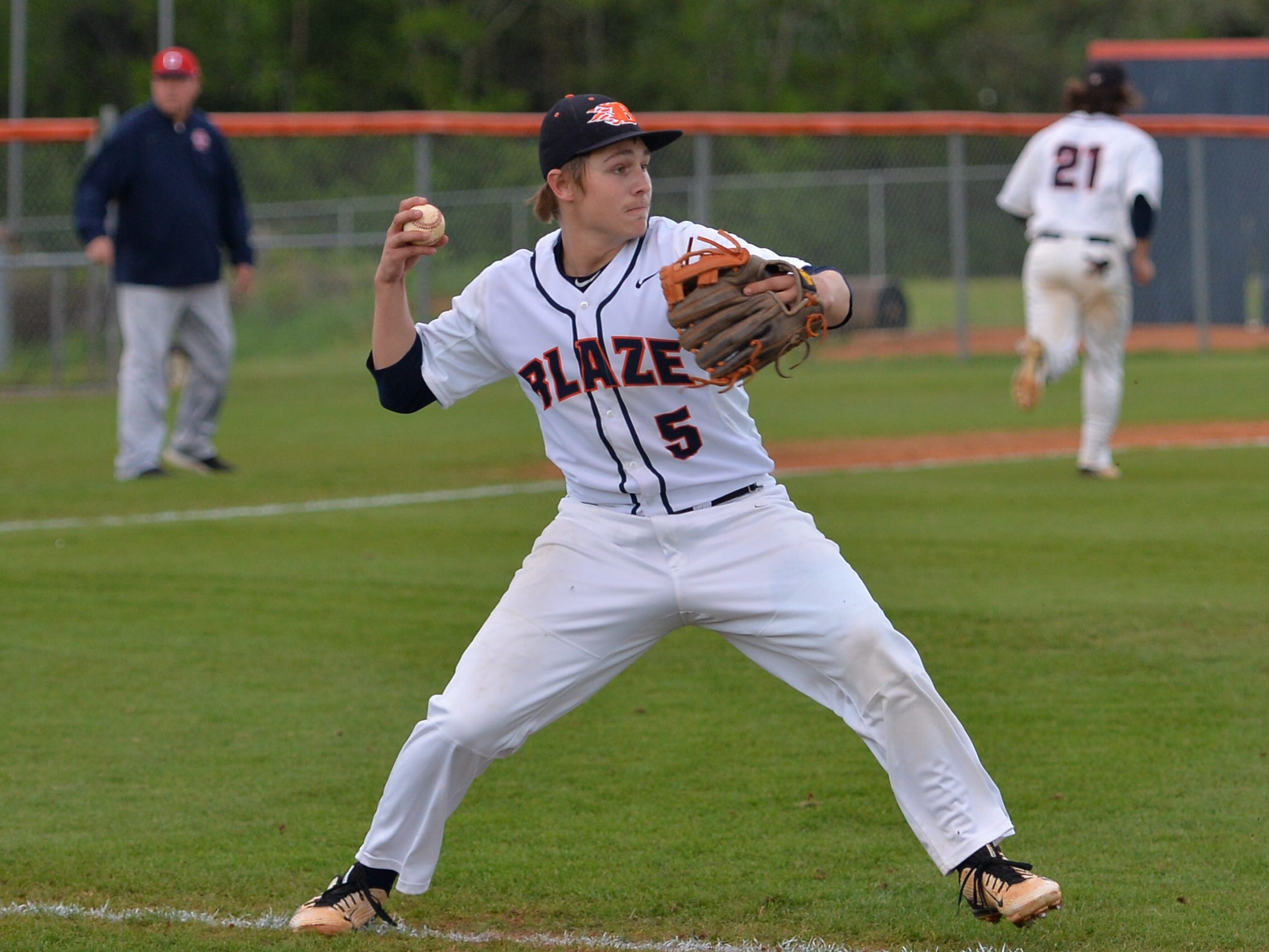 Blackman pitcher Matt Harnish prepares to throw to first base during the Blaze’s 7-6 win over Oakland Wednesday.