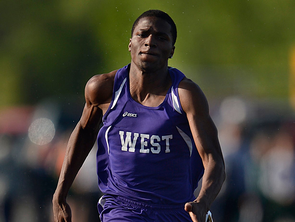 Green Bay West's Dontae Williams races towards the finish line while competing in the 100-meter dash finals during the WIAA Division 1 regional tack and field meet at Bay Port High School in Suamico on Tuesday, May 26, 2015.