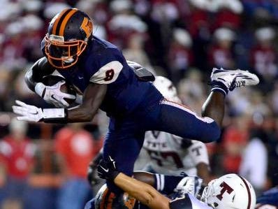 Escambia grad Jabir Frye (blue jersey) is off to a hot start for the Troy Trojans in the Sun Belt Conference.