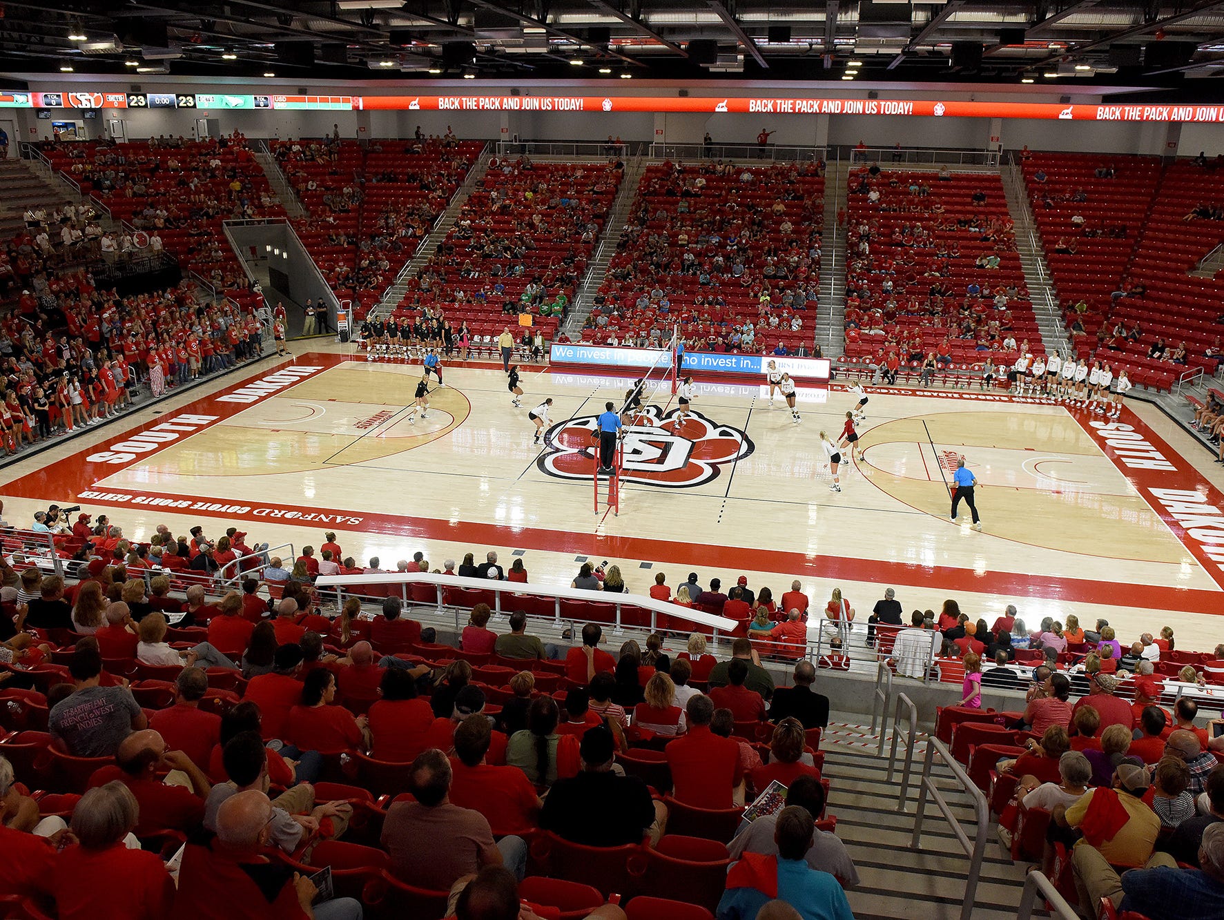 The Sanford Coyote Sports Center is packed to watch USD women's volleyball team play UND on Tuesday in Vermillion.