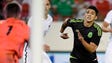 Mexico's Alan Pulido (9) goes in for a shot against