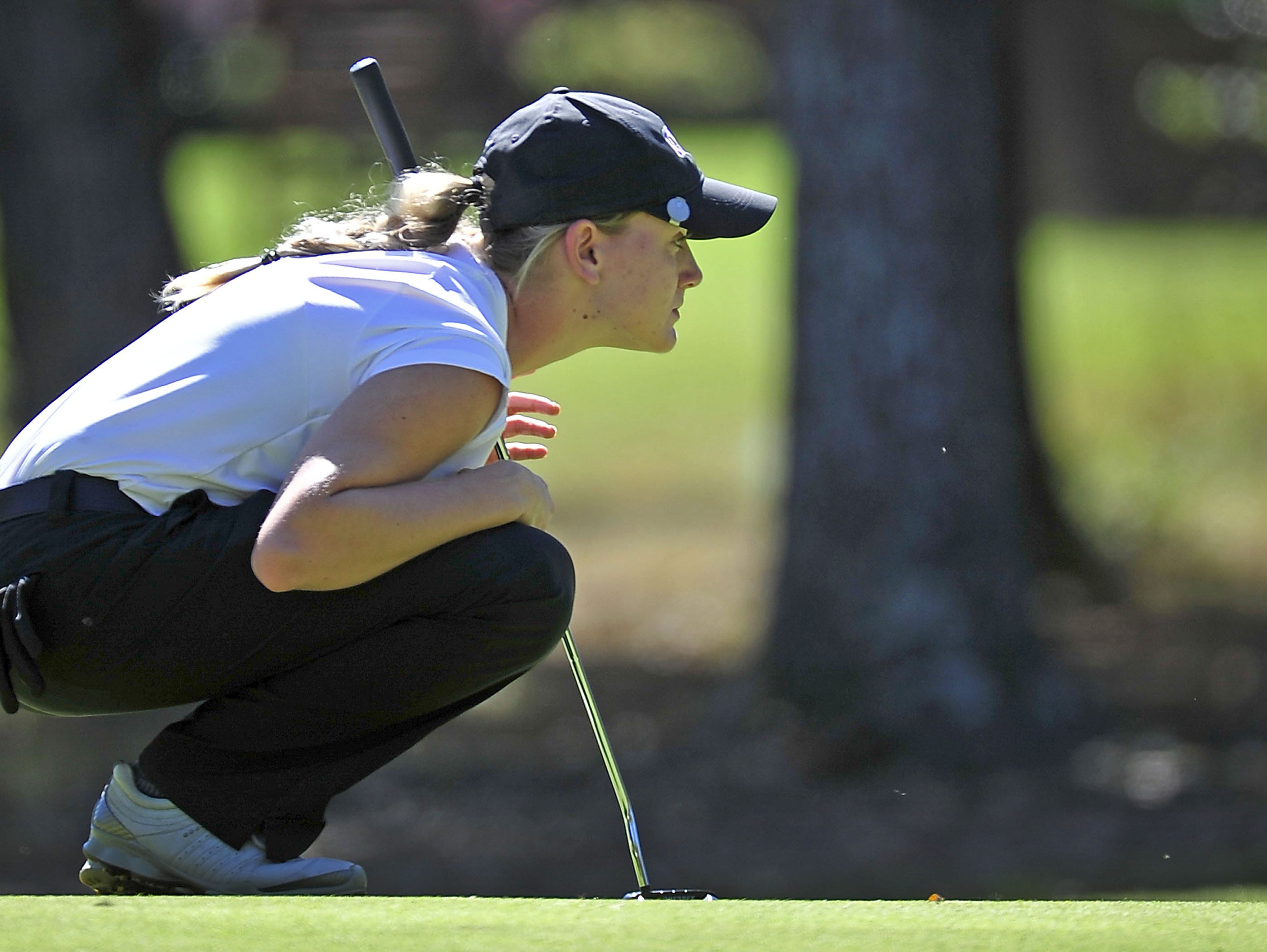 CPA's Siarra Stout won back-to-back Class A/AA state golf titles.