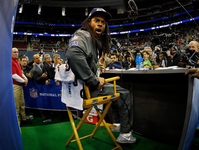 Seattle Seahawks cornerback Richard Sherman speaks to the media during Media Day for Super Bowl XLVIII at Prudential Center.