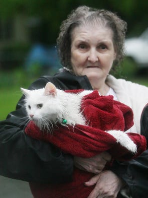 Alma Ferrell and her cat Divine recover after being