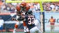 Cincinnati Bengals running back Giovani Bernard (25) rushes the ball against Chicago Bears cornerback Charles Tillman (33) during the fourth quarter at Soldier Field.