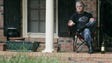 Donald Fontaine sits on his Rebel Circle front porch