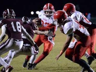 Westmoreland High senior tailback Brandon Green carries the ball during Friday night’s game.