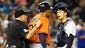 Aug. 25: Astros OF Carlos Gomez is restrained as Gomez