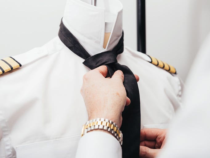 Air Canada's new employee uniforms include flight attendants, pilots