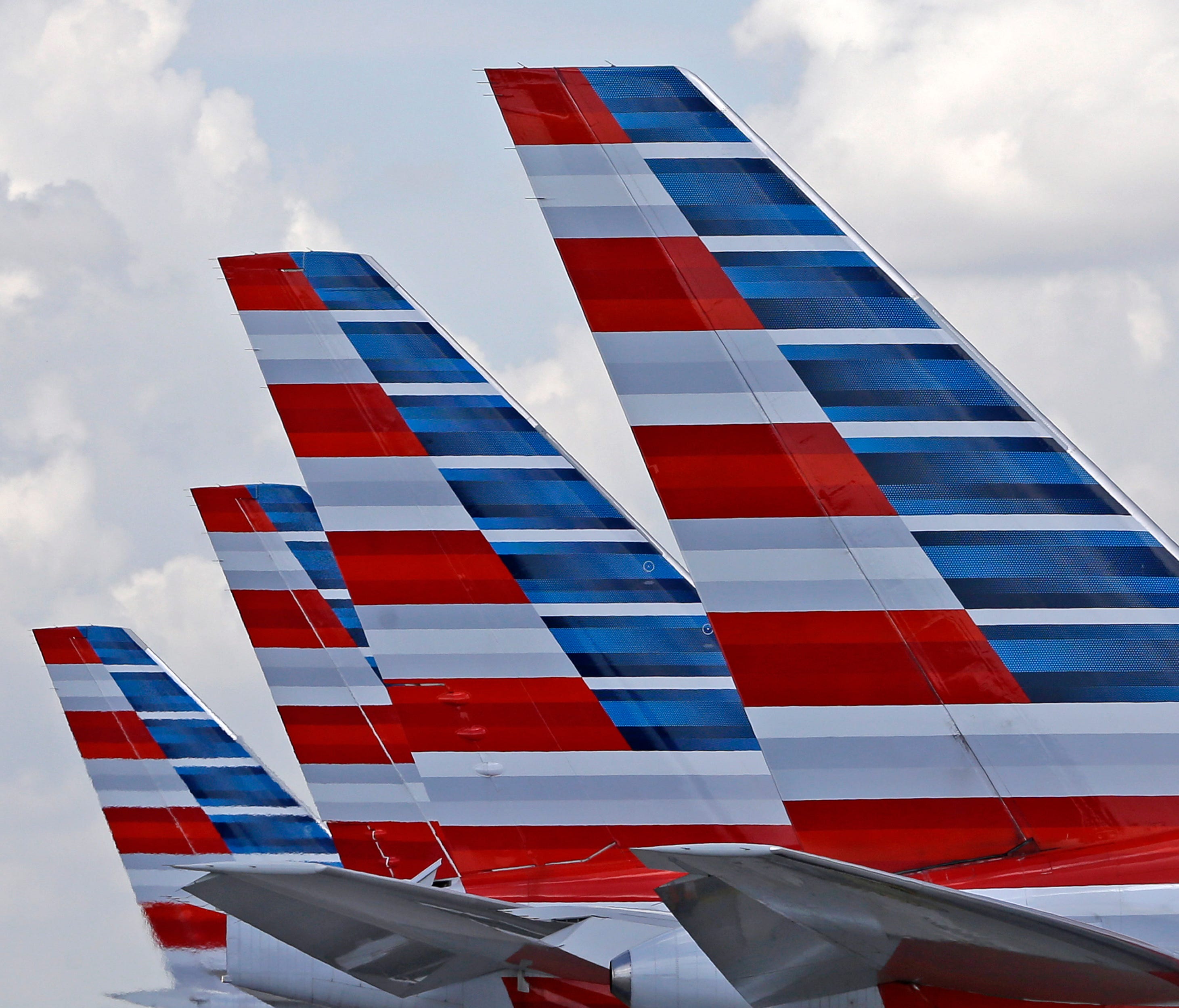 American Airlines planes parked at Miami International Airport.
