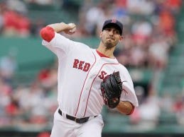 Boston pitcher Rick Porcello delivers during the first inning. (AP Photo/Charles Krupa)