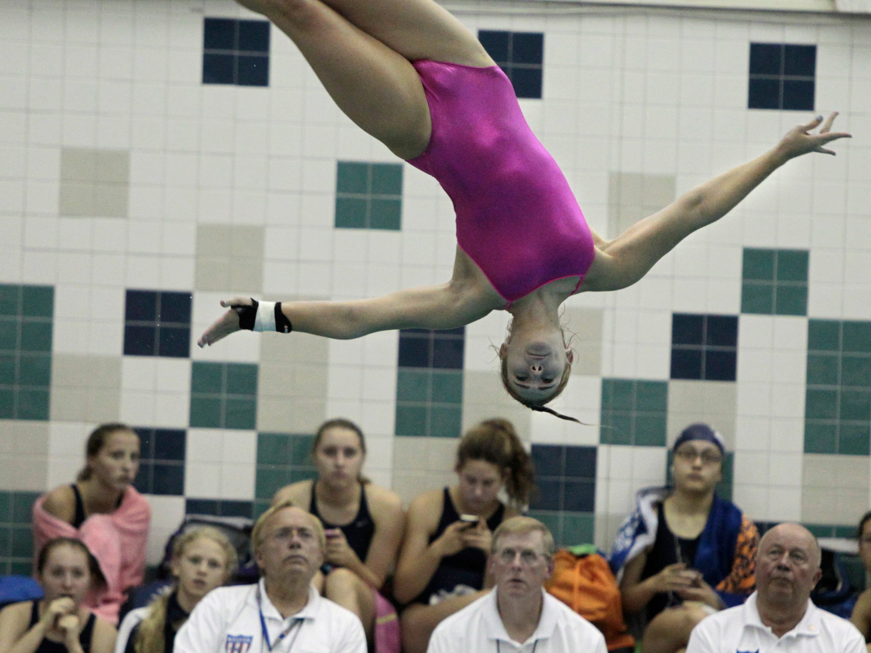 Pittsford junior Maddie Schaefer dazzles the judges and the crowd during a meet against Webster earlier this month.