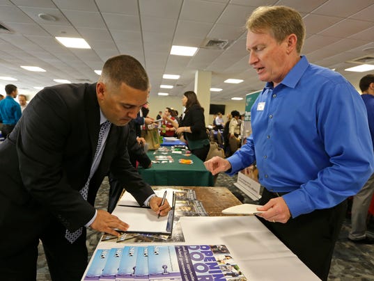 Job openings hit 14-year high, hiring up