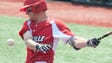 Louisville Cardinals' Nick Solak swings at the ball