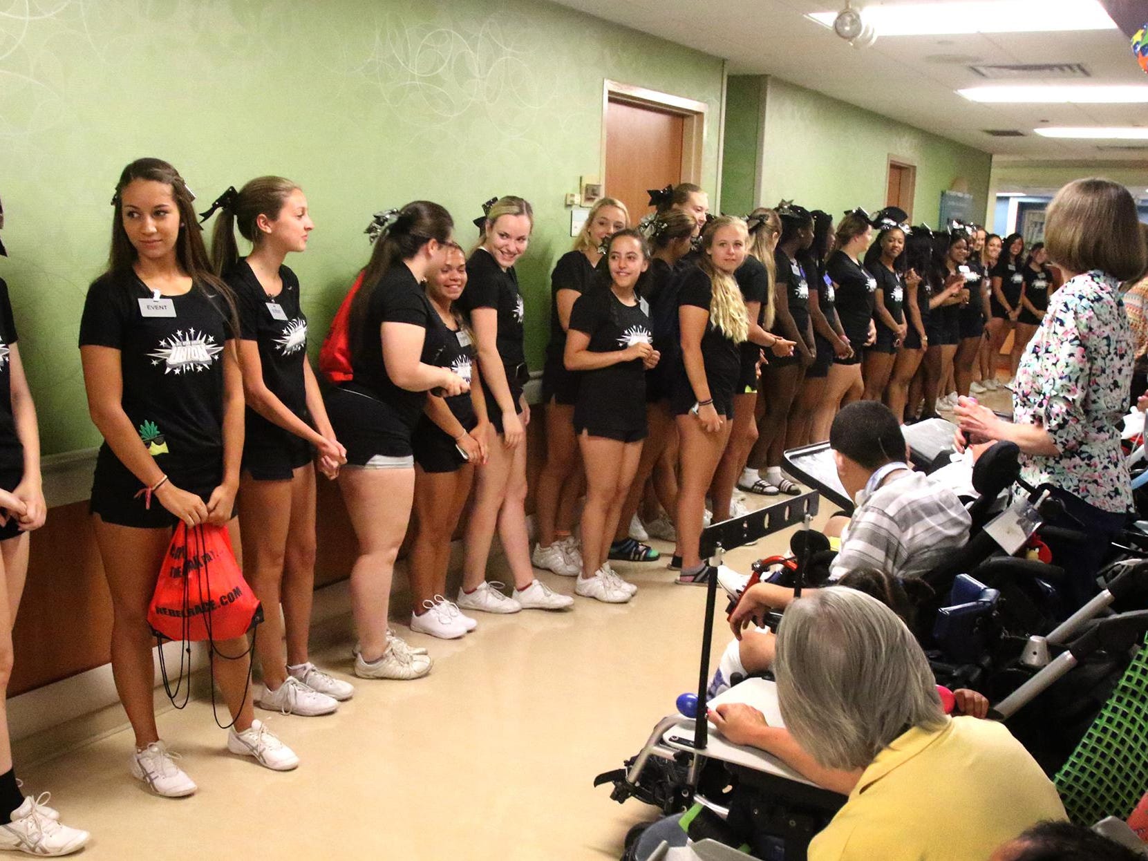 Cheerleaders perform at Children’s Specialized Hospital in Mountainside on Monday as the Snapple Bowl’s Union County All-Stars made their annual visit.