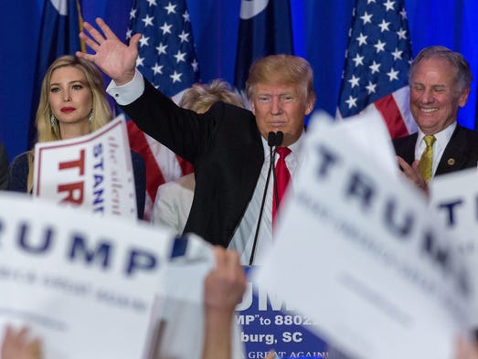 Trump acknowledges cheering supporters celebrating