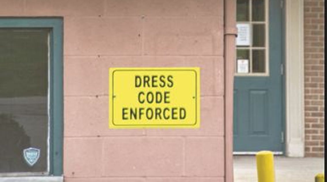 Fair rejects dress code