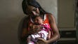 Leticia de Araujo holds one month old daughter, one-Manuelly