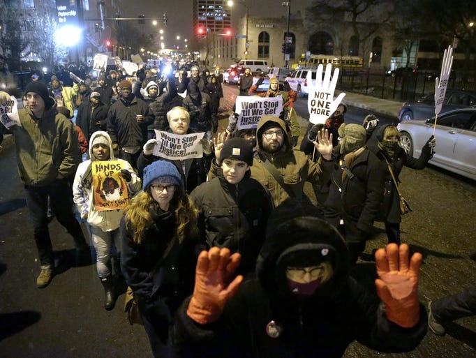Protesters march during a rally near the Chicago Police