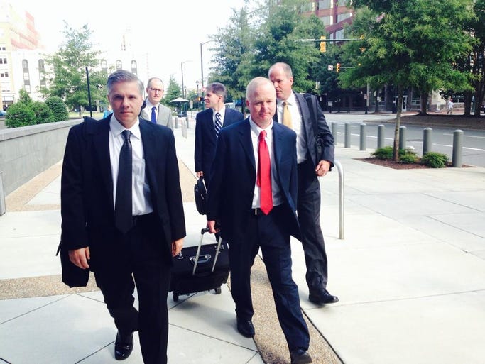 Prosecutors stone faced and silent as they walk into courthouse on day 3
